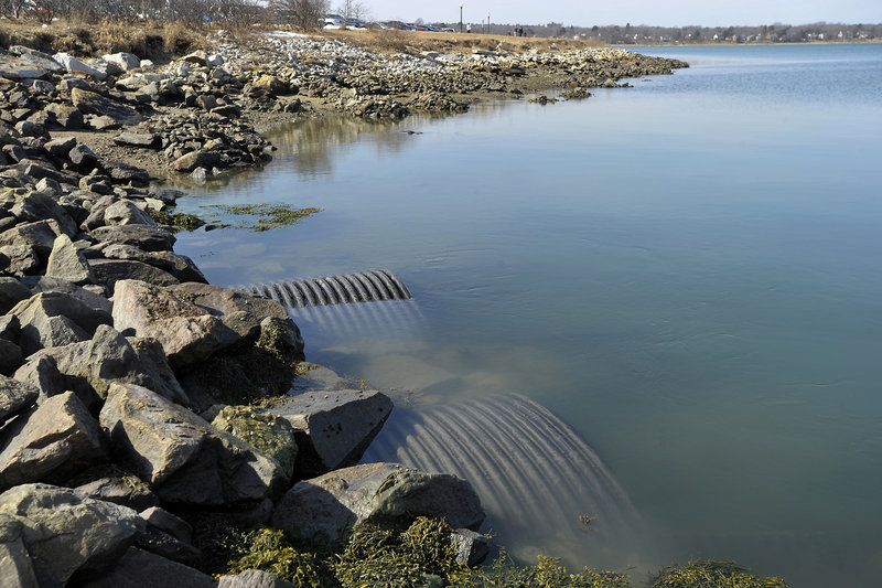 During heavy rain, pipes near Preble Street Extension and Marginal Way discharge a combination of untreated sewage and stormwater runoff into Back Cove. The city has approved a 15-year, $170 million plan to ease the problem and is trying to decide how to pay for it.