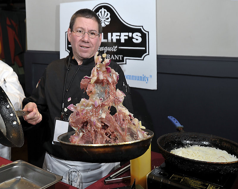 Norm Hebert Jr., executive chef and co-owner of Bintliff’s in Ogunquit, tosses brisket for his corned beef hash during last week’s Incredible Breakfast Cook-Off in South Portland. Hebert’s recipe calls for “water, pickling spice and TLC,” he said.