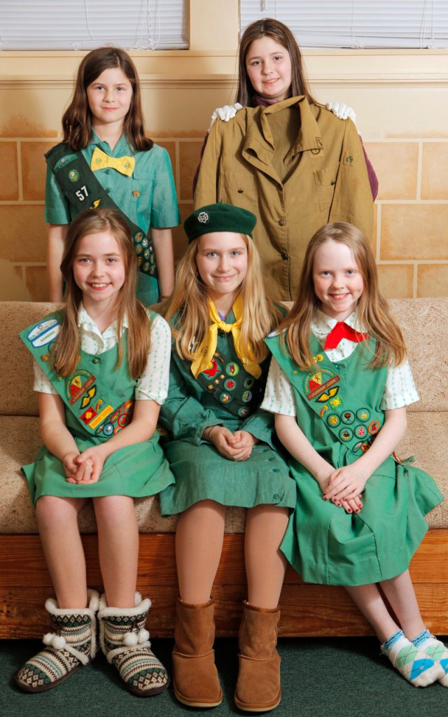 Girl Scouts in Troop 42 from Cumberland and North Yarmouth model Girl Scout uniforms from different decades at the Cumberland Congregational Church last week. Front row, left to right: Madison Weatherbee, Isabella Chandler and Kylie Josephson. Back row, left to right: Abigail Cloutier and Hannah Craig.