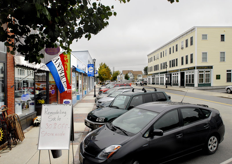 Business owners on Ocean Street in South Portland say their customers prefer the current diagonal parking spaces.