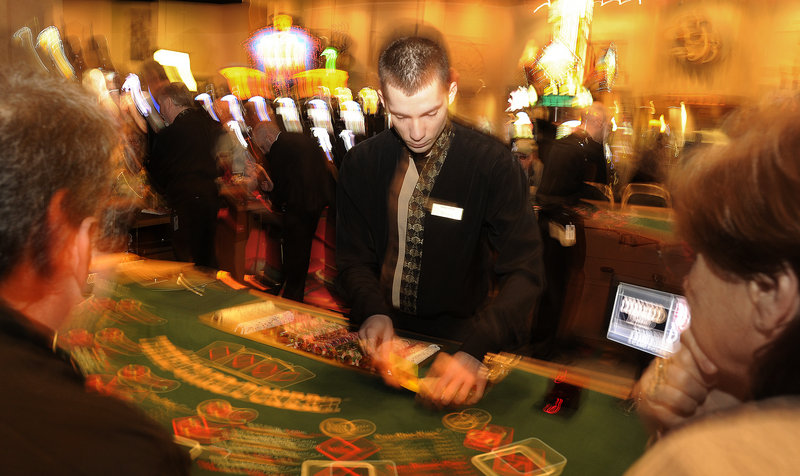 Shawn Hollobaugh deals cards in a game of three-card poker at the Hollywood Casino Hotel & Raceway in Bangor on Friday morning.