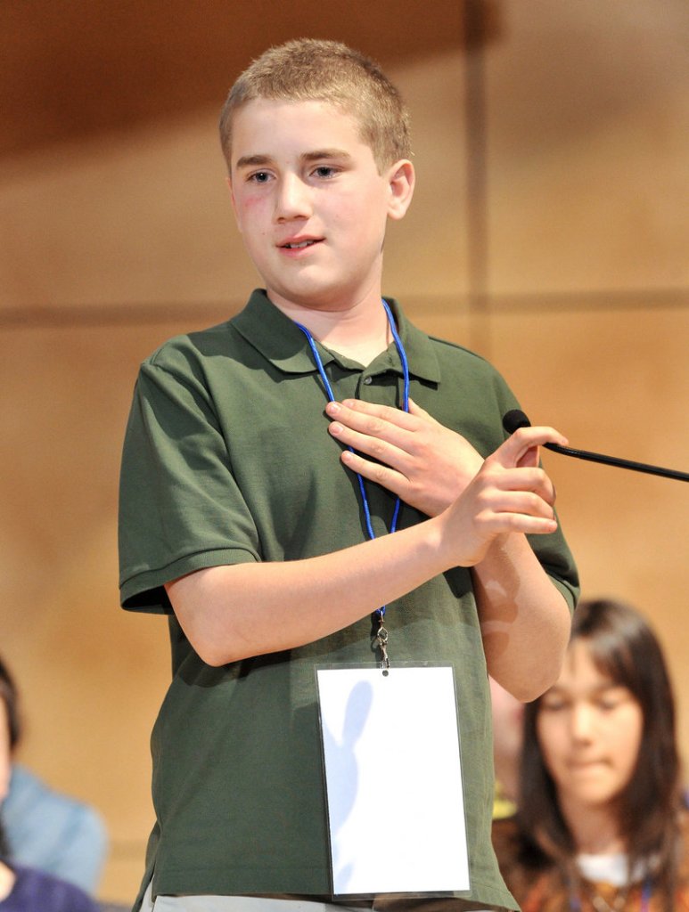Nat Jordan, 12, the Cumberland County contestant, spells his final word to win the Maine State Spelling Bee on Saturday.