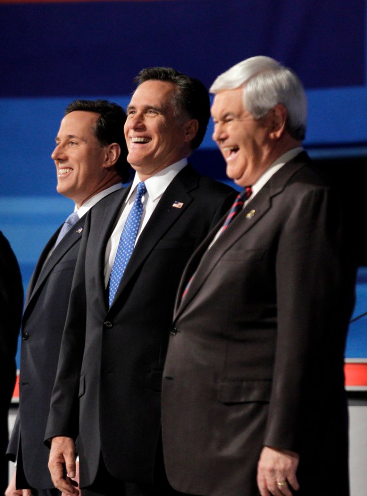 In the runup to the Illinois GOP presidential primary Tuesday, Mitt Romney, center, is pouring millions into advertising. A poll last week put Rick Santorum, left, within striking distance of Romney there, while Newt Gingrich is planting doubts about Romney.