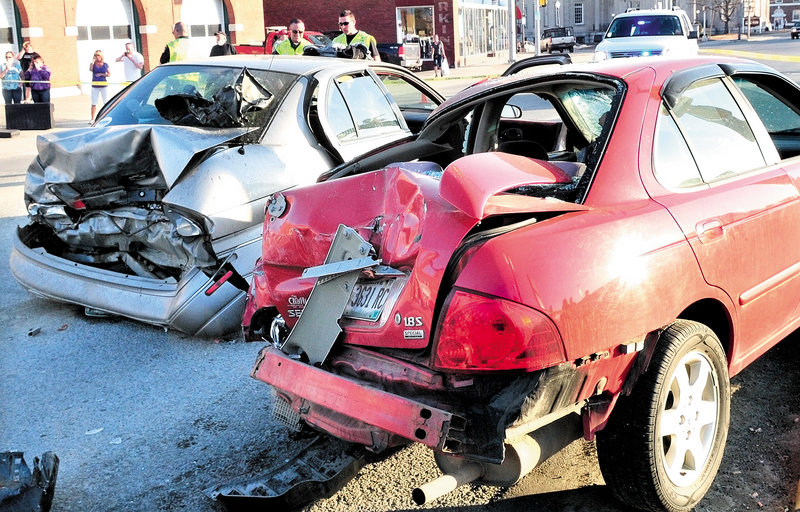 These two vehicles were rear-ended along with three other vehicles waiting at a traffic light at College Avenue and Main Street in Waterville on Sunday, sending several occupants to the hospital.