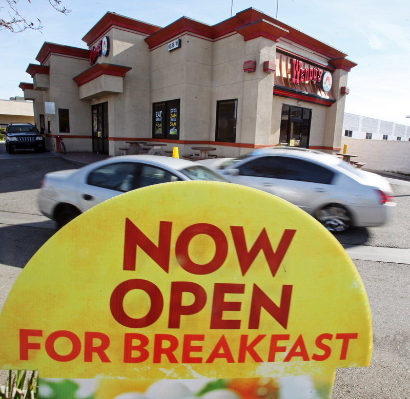 A sign promotes breakfast at a Wendy’s restaurant in Culver City, Calif.
