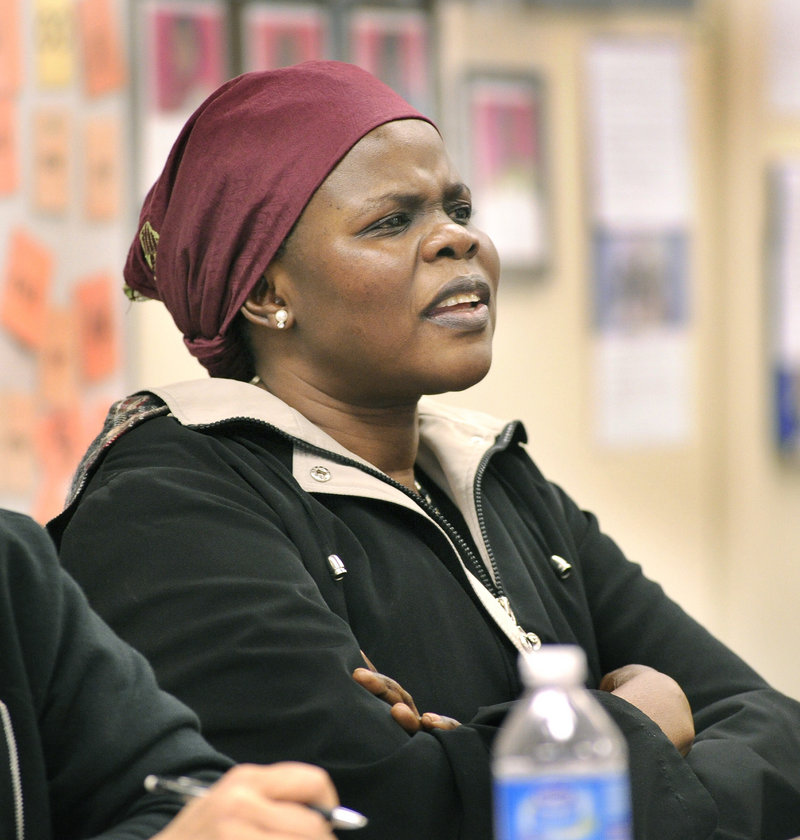 Christina Marring from Sudan listens to teacher Sarah Staples in an English class at the West School.