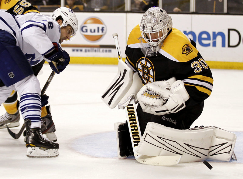 Tim Thomas faced just 13 shots, and this was one of them, a save on Toronto’s Clarke MacArthur in Monday’s game at Boston. The Bruins crushed the Maple Leafs 8-0, winning all six games with Toronto this season.