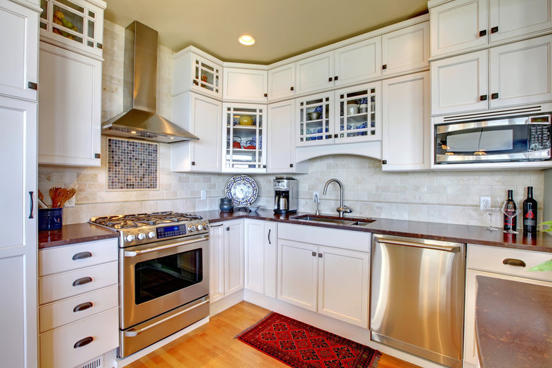 Buyers like kitchens outfitted with stainless-steel appliances, but if you can’t afford that, smaller updates such as painting cabinets and changing out cabinet hardware might help.