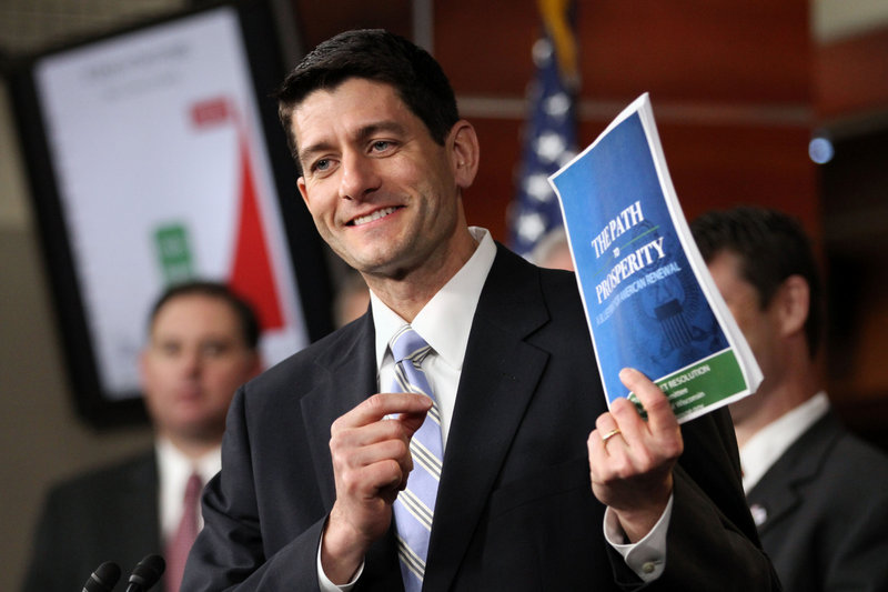 House Budget Committee Chairman Rep. Paul Ryan, R-Wis., holds up a copy of his budget plan, titled “The Path to Prosperity,” on Tuesday in Washington.