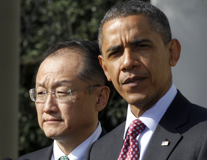 President Barack Obama stands with Jim Yong Kim, his nominee to be the next World Bank president, in the Rose Garden of the White House on Friday.