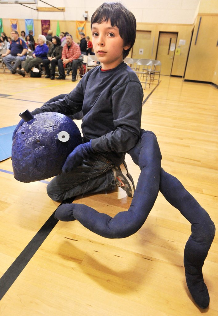 Reed Henderson of Gorham's Narragansett School team plays the role of an octopus during the Ohh-Motional Vehicle competition.