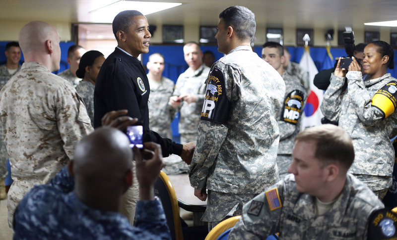 President Obama meets troops on Sunday in the dining hall at Camp Boniface just outside the Demilitarized Zone, the tense military border between North and South Korea. The president is attending a Nuclear Security Summit in Seoul.