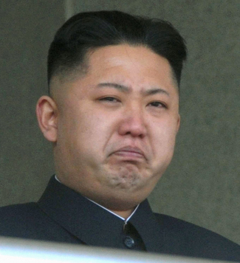 North Korea’s leader Kim Jong Un weeps during a ceremony in Pyongyang on Sunday to mark 100 days since the death of his father, Kim Jong Il.