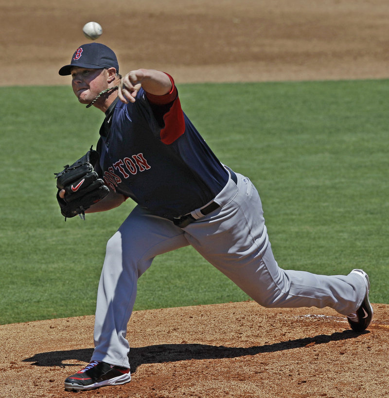 Jon Lester delivers in the first inning Monday as the Red Sox shut out the Philadelphia Phillies 6-0 during their spring training game in Clearwater, Fla.
