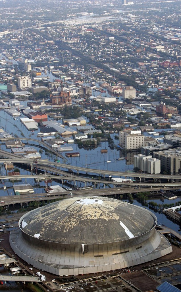 Just the beginning? After Hurricane Katrina, the Louisiana Superdome was surrounded by flood waters in 2005. A climate change study suggests events like Katrina may become more commonplace.