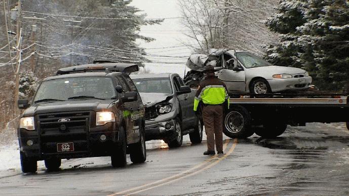 Officials remove vehicles involved in a fatal crash Wednesday morning that claimed the life of Elizabeth Polletto, 26.