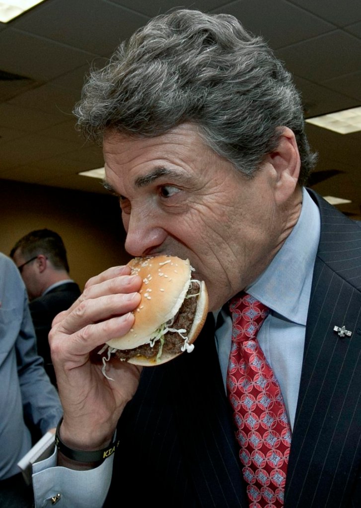 After the plant tour, Texas Gov. Rick Perry ate a hamburger containing the product officially called lean finely textured beef.