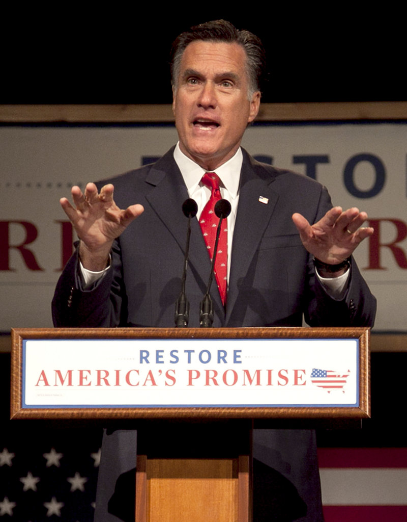 Republican presidential candidate Mitt Romney defends his “success” while speaking to voters at Lawrence University in Appleton, Wis., on Friday.