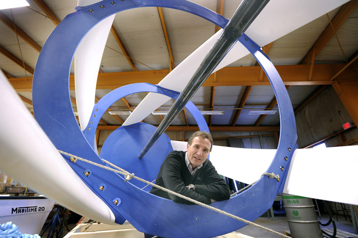 John Ferland, vice president of project development with Ocean Renewable Power Co., stands inside one of the company's all-composite tidal turbines in this February 2010 photo.