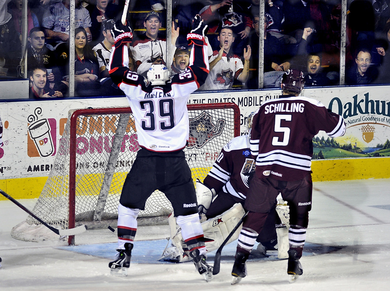 Brett MacLean of the Portland Pirates starts what became a familiar sight Friday night at the Cumberland County Civic Center – a celebration following a goal. The Pirates won a crucial game in the playoff race, skating away with a 6-4 victory against the Hershey Bears.