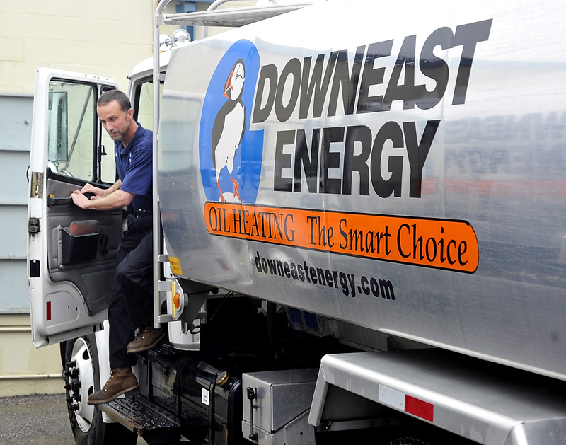 Steve Trudelle exits a truck Monday at the South Portland office of Downeast Energy.