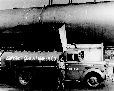 Downeast Energy started as Brunswick Coal in 1908. By the 1940s, when Charlie Descheneaux, above, worked as a truck driver, the company was Brunswick Coal & Lumber.