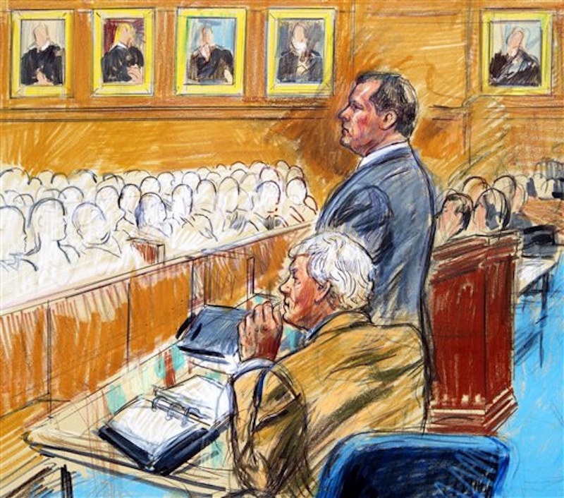 This artist rendering shows former Major League Baseball pitcher Roger Clemens, standing, and his attorney Rusty Hardin, front left, facing prospective jurors inside federal court in Washington, Monday, April 16, 2012, during jury selection in the perjury trial. (AP Photo/Dana Verkouteren)