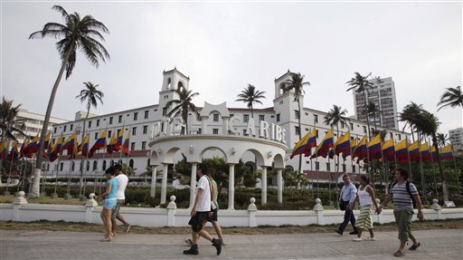 People walk past Hotel El Caribe in Cartagena, Colombia, today. The Secret Service sent home some of its agents for misconduct that occurred at the hotel before President Obama's arrival Friday for the Summit of the Americas.