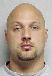 This undated booking mug provided by the Portsmouth, N.H., Police Department via the Portsmouth Herald shows Cullen Mutrie, suspected of killing Greenland, N.H., Police Chief Michael Maloney and wounding four other officers Thursday, April 12, 2012, before he was found dead along with a female acquaintance early Friday morning. (AP Photo/Portsmouth Police Department via Portsmouth Herald)