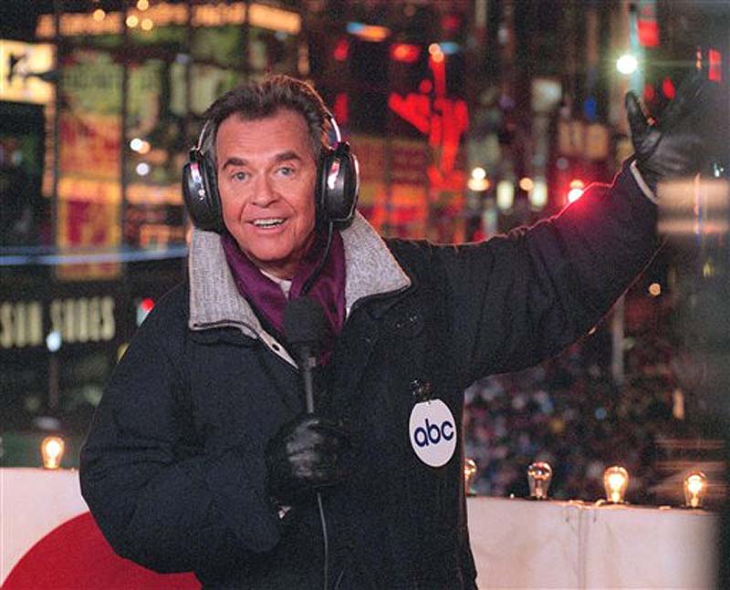 In this undated file photo released by ABC, Dick Clark hosts the New Year's Eve special from New York's Times Square. Clark, the television host who helped bring rock `n' roll into the mainstream on "American Bandstand," has died. He was 82. (AP Photo/ABC, Donna Svennevik, File)