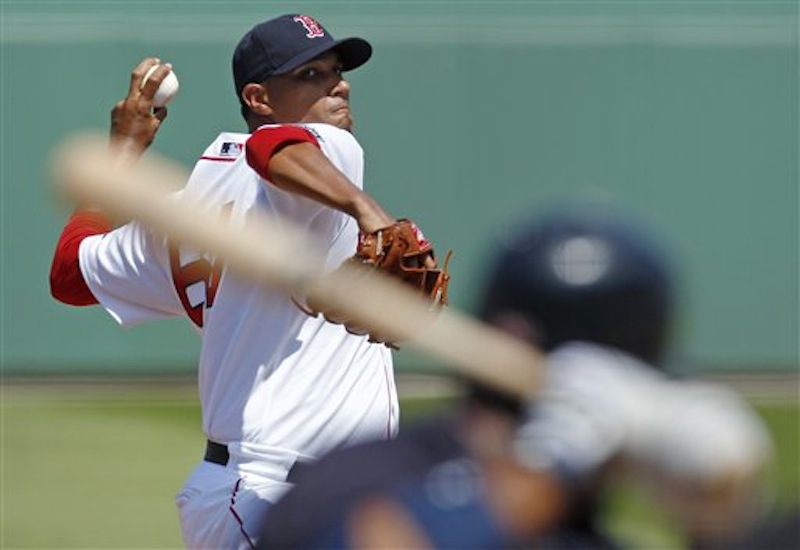 Boston Red Sox starter Felix Doubront winds up on a pitch to to Minnesota Twins' Alexi Casilla during the second inning of a spring training baseball game in Fort Myers, Fla., Monday, March 19, 2012. (AP Photo/Charles Krupa)