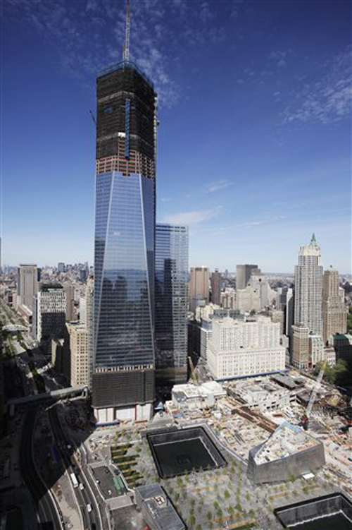 An April 17 photo of One World Trade Center, as it rises above the lower Manhattan skyline and the National September 11 Memorial, lower right, in New York.
