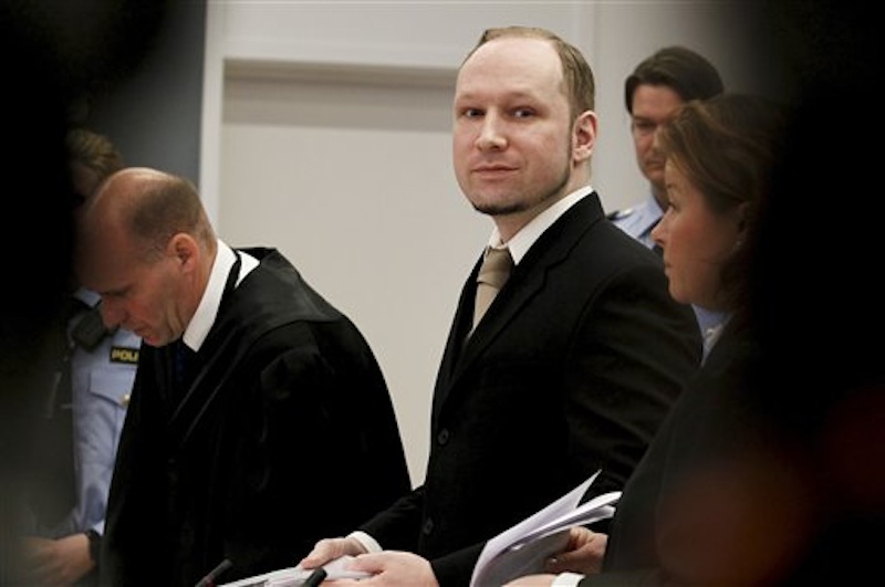 Accused Norwegian Anders Behring Breivik arrives at the courtroom, in Oslo, Norway, Tuesday April 17, 2012. The anti-Muslim fanatic who admitted to killing 77 people in a bomb-and-shooting massacre is set to take the stand in his terror trial. Anders Behring Breivik will have five days to explain why he set off a bomb in Oslo's government district, killing eight, and then gunned down 69 at a Labor Party youth camp outside the Norwegian capital. (AP Photo/Heiko Junge/Scanpix Norway, Pool)
