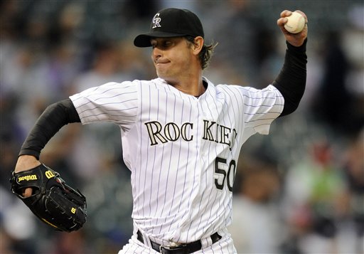 Colorado Rockies starting pitcher Jamie Moyer throws during the second inning of the historic game against the San Diego Padres on Tuesday in Denver.