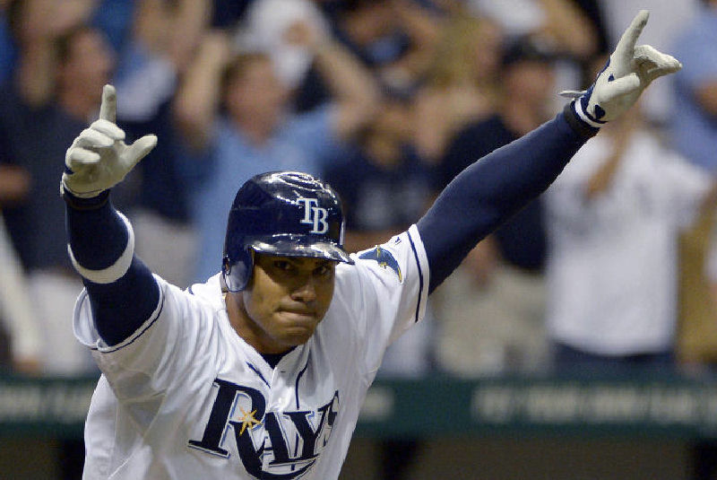 Tampa Bay Rays' Carlos Pena celebrates after hitting a game-winning RBI single in the bottom of the ninth for a 7-6 win over the New York Yankees on Friday in St. Petersburg, Fla. The Yankees lost all three games to the Rays this weekend to start the season 0-3.
