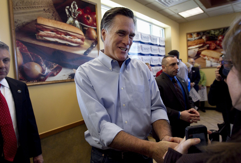 Republican presidential candidate, former Massachusetts Gov. Mitt Romney greets people during a campaign stop at a Cousins Subs restaurant, in Waukesha, Wis., today, when Wisconsin Republicans are voting in their presidential primary.