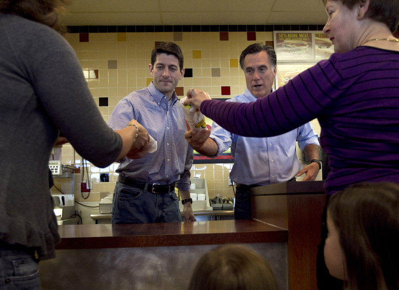 U.S. Rep. Paul Ryan, R-Wis., left, and former Massachusetts Gov. Mitt Romney hand out submarine sandwiches during a campaign stop this week in Waukesha, Wis.