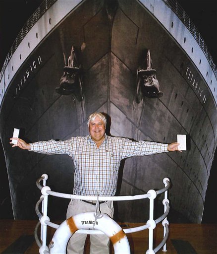 In this April 25, 2012 photo provided by Crook Publicity, Australian billionaire Clive Palmer poses in front of an artist impression of the Titanic ll at MGM Studios in Los Angeles, Ca. Palmer said Monday, April 30, 2012, that he'll build a high-tech replica of the Titanic at a Chinese shipyard and its maiden voyage in late 2016 will be from England to New York, just like its namesake planned. (AP Photo/Crook Publicity)
