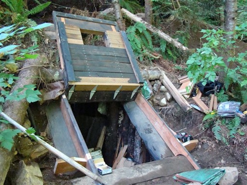 This undated photo provided by the King County Sheriff's Department on Friday, April 27, 2012, shows a bunker that deputies say belongs to a man suspected of killing his wife and daughter and holing up for days in the Cascade foothills east of Seattle. (AP Photo/King County Sheriff's Department)