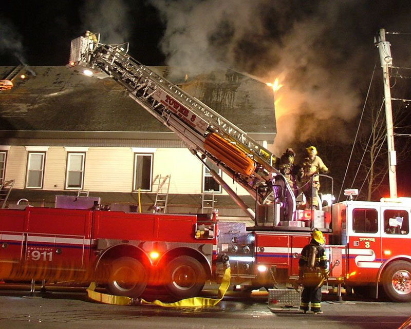 The scene last night as fire crews fight a four-alarm fire in Gorham at the corner of routes 114 and 25.