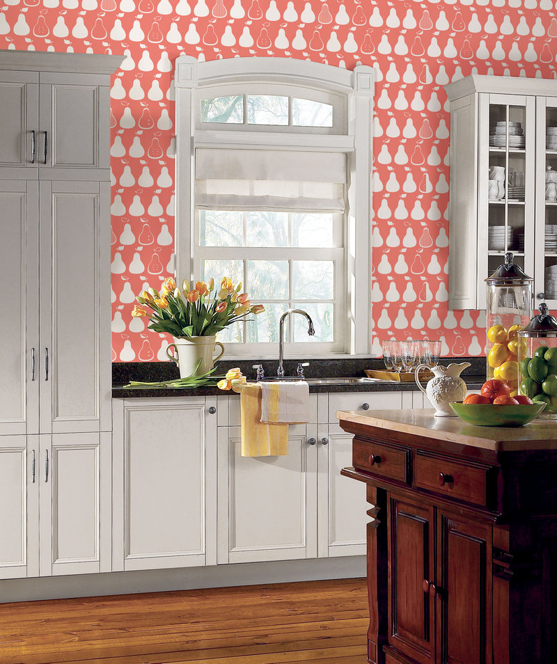 Throwback wall coverings, such as this pattern of pears in white and coral, are all the rage with designers.