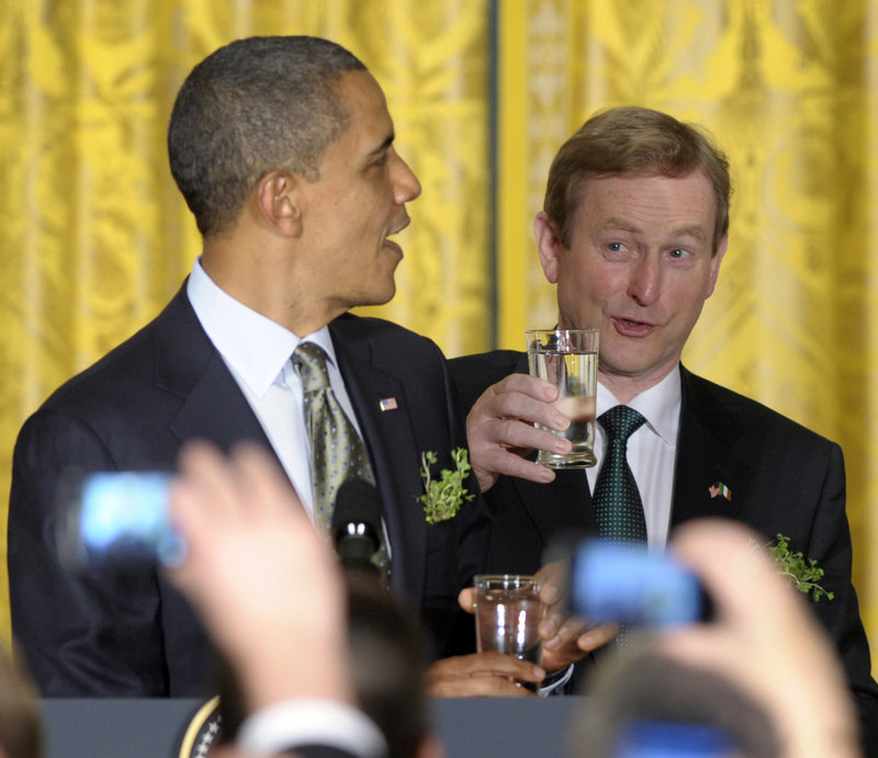 President Obama and Irish Prime Minister Enda Kenny prepare for a toast during a St. Patrick’s Day reception in the East Room of the White House in Washington.