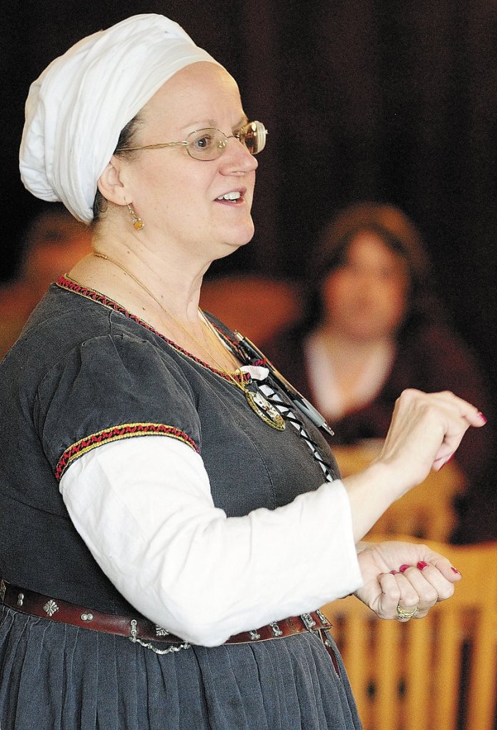 Susan Maebert-Frank, known as Baroness Mistress Suzanne Neuber de Londres, teaches a class during the East Kingdom Brewers’ Collegium sponsored by the Society for Creative Anachronism on Saturday in Augusta. Maebert-Frank is leader of the East Kingdom Brewers’ Guild and a resident of Long Island.