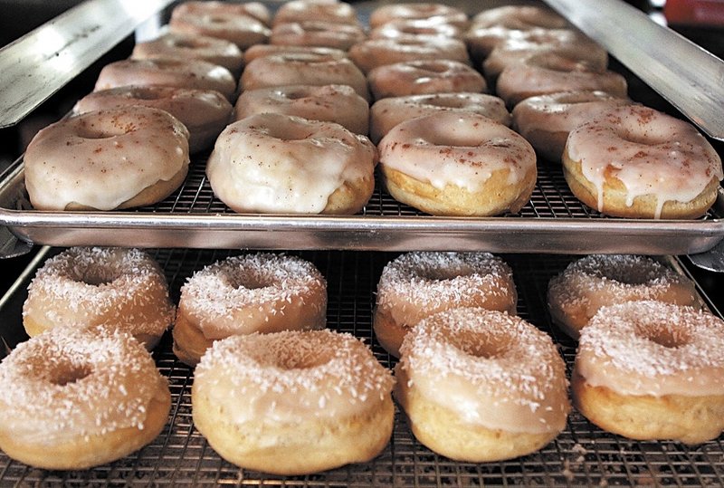 Dun-Well Doughnuts come in dozens of varieties, including root beer, tangerine, and a jelly doughnut with peanut butter icing.