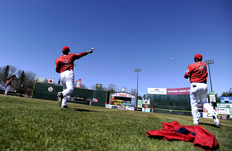 Heiker Meneses, left, Oscar Tejeda and the rest of the Portland Sea Dogs worked out Tuesday at Hadlock Field for the first time this season, preparing for a doubleheader opener Thursday at Reading. The home opener will be April 12.