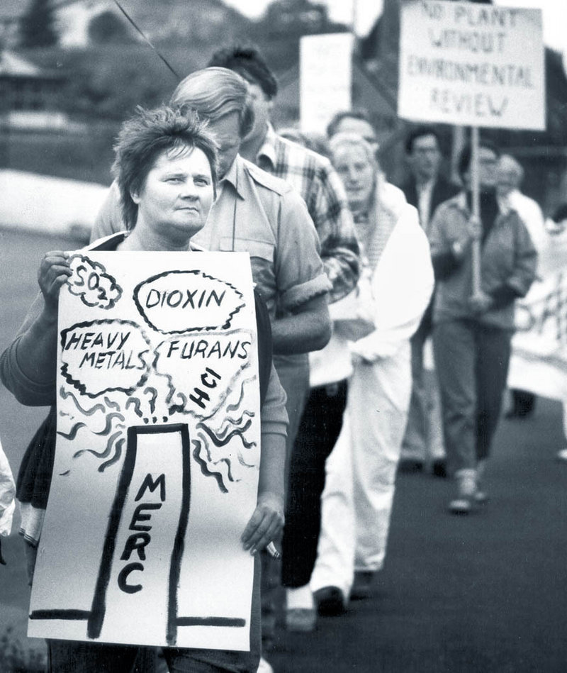 People protest outside the MERC plant in Biddeford in 1989. Noise, odor and toxic ash spewing from the towering stack made the incinerator a frequent target of protesters.