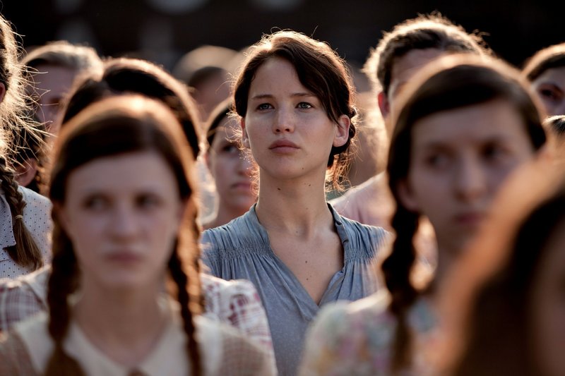 Girls await a possibly fatal selection in “The Hunger Games,” a film too full of killing for at least one 7th grader to watch.
