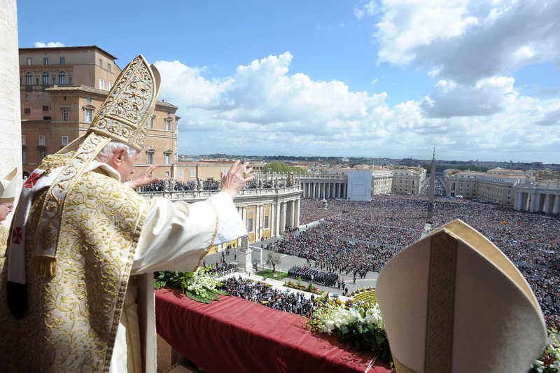 Pope Benedict XVI greets the faithful after his “to the city and to the world” speech at the end of the Easter Mass in St. Peter’s Square at the Vatican on Sunday.