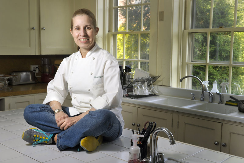Chef Carmen Gonzalez, above, in the kitchen at The Danforth Inn in Portland, where she is busily preparing for the planned May opening of Carmen at The Danforth. Gonzalez’s plans for the summer menu emphasize seafood with a Latin twist.