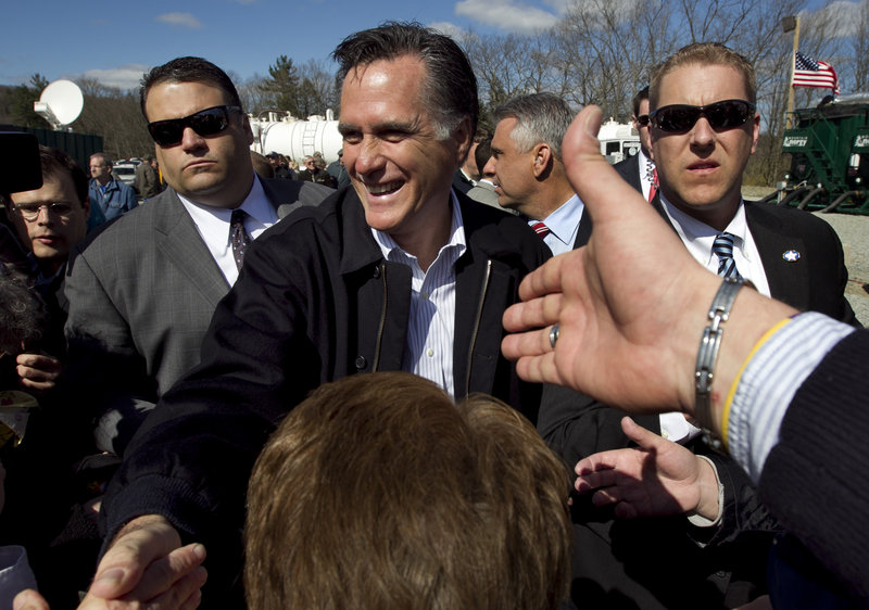 Mitt Romney greets supporters last week in Tunkhannock, Pa. The GOP front-runner’s plans if elected president include rewriting the way all federal regulations are issued.